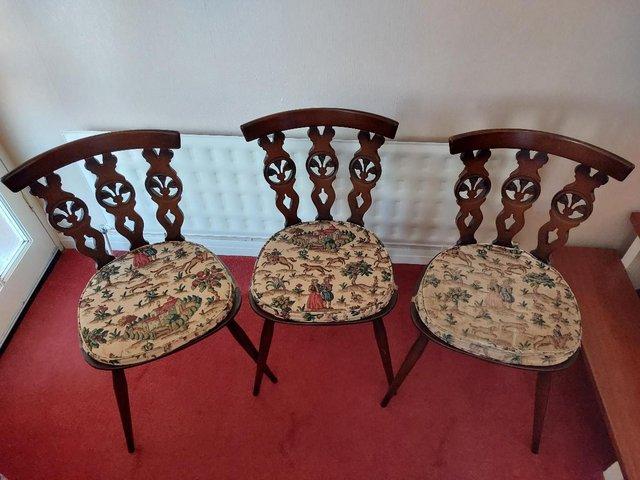 Preview of the first image of Ercol Fleur De Lys Dining Chairs, Old Colonial 375.