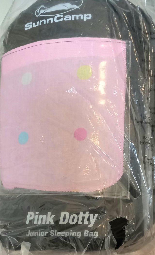 Preview of the first image of New Pink Dotty Sleeping Bag With Pillow.