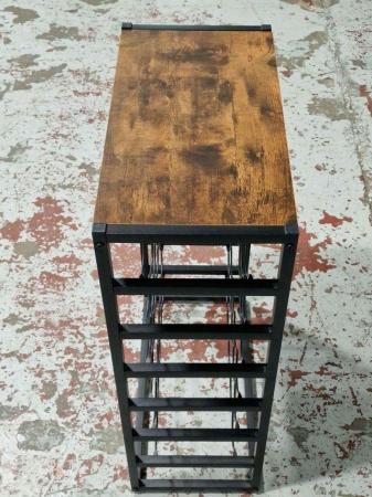 Image 2 of One Wood and Black Metal Wine rack in good condition.