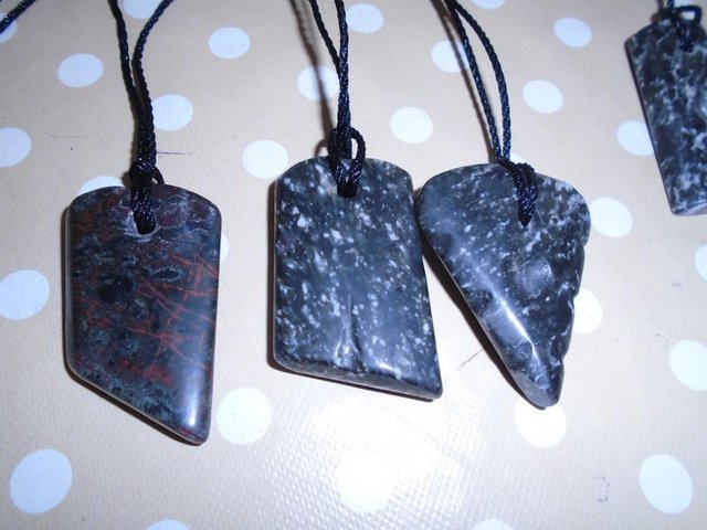Preview of the first image of cornish serpentine pendants cut and polished maori style.