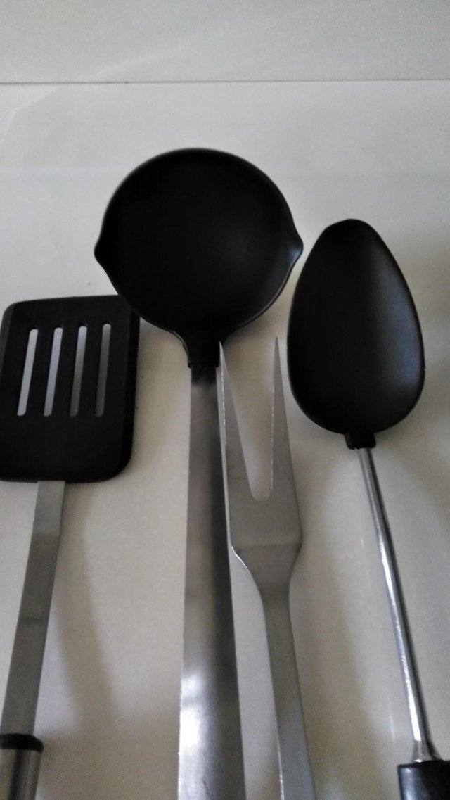 Preview of the first image of Four kitchen utensils and kitchen glass board.