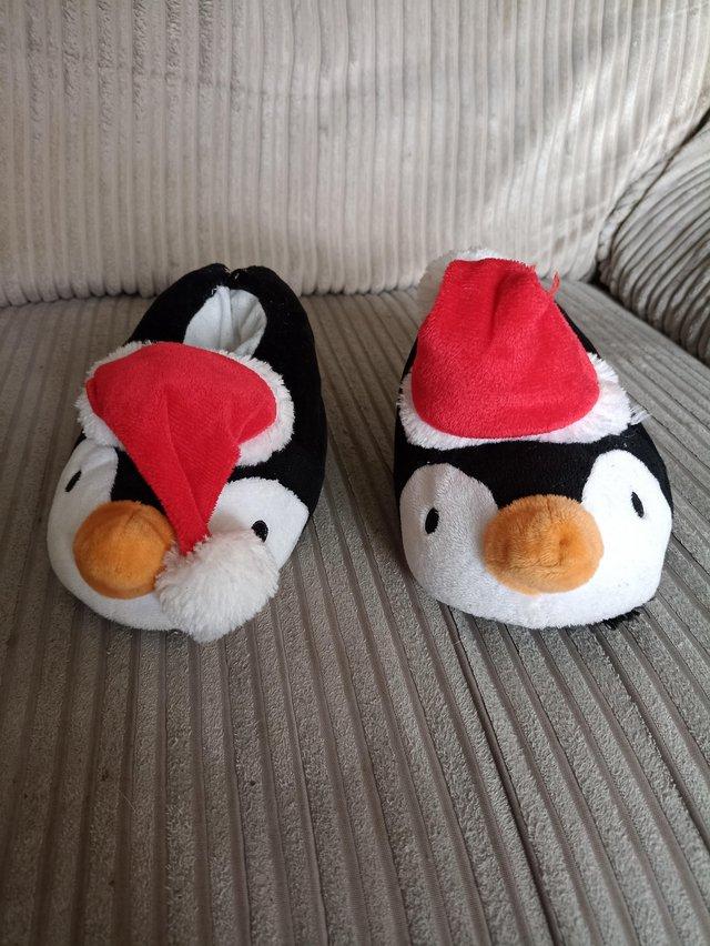 Preview of the first image of Kids penguin Christmas slippers.