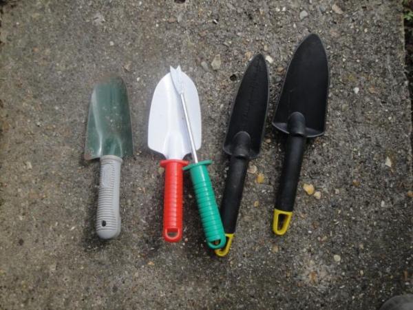 Image 1 of Variety of Garden Trowels and One Weeder Tool; - Not new