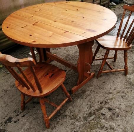 Image 1 of Pine farmhouse dropleaf table and 2 chairs