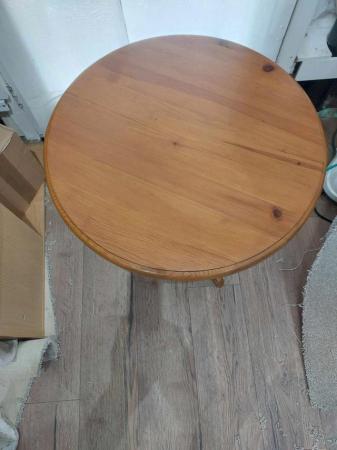 Image 2 of Small round  pine occasional/coffee table