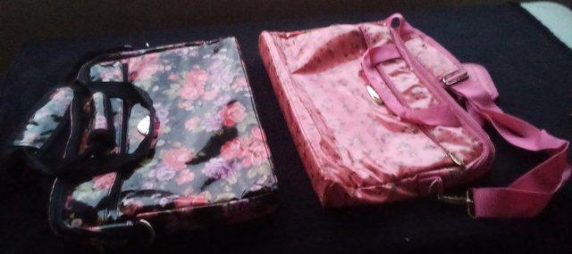 Preview of the first image of Laptop Bags Padded Flower Print.  £5 each.