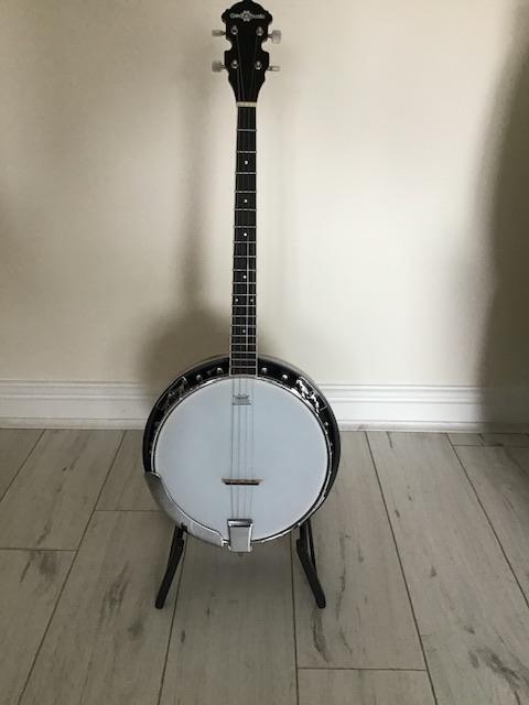 Preview of the first image of Tenor banjo with padded gig bag.