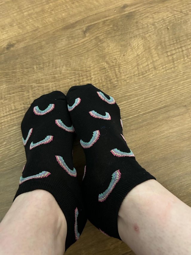 Preview of the first image of Ladies worn rainbow socks.