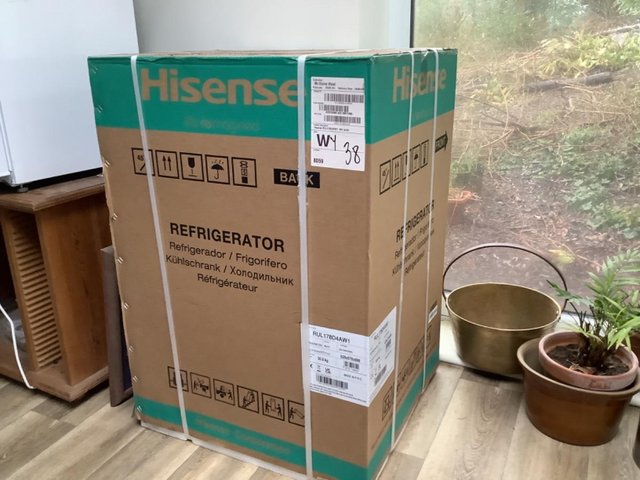 Preview of the first image of Hisense Integrated fridge, brand new in box.