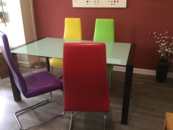 Image 1 of Dining table and 4 chairs.  Good condition.