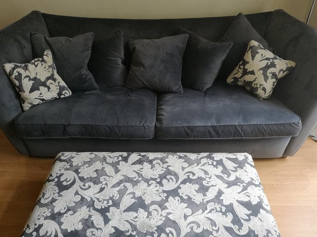 Preview of the first image of Beautiful Large Grey Sofa with footstool.
