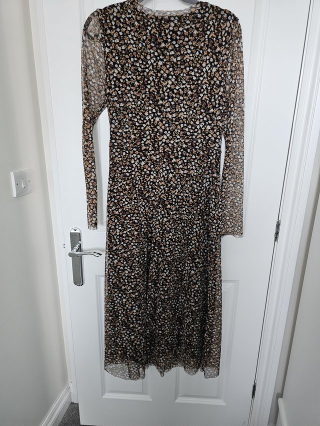 Preview of the first image of Nutmeg dress size12 new unworn.