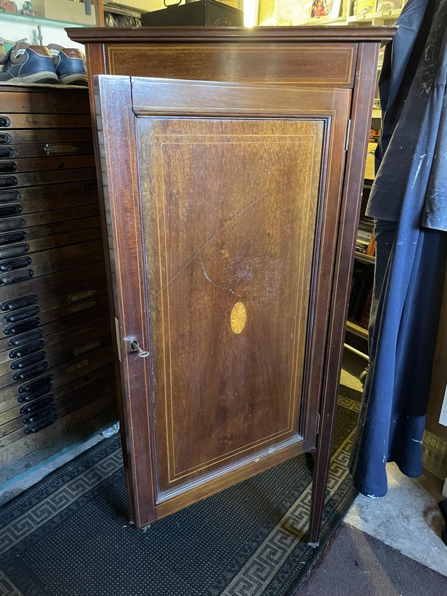 Preview of the first image of Antique Edwardian tall cabinet.