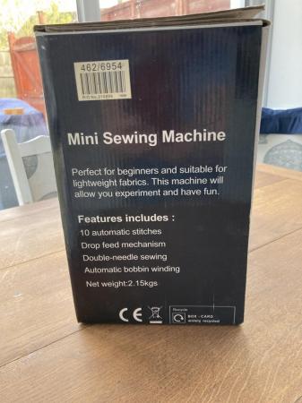 Image 2 of Mini sewing machine. Good Condition with box and operators m