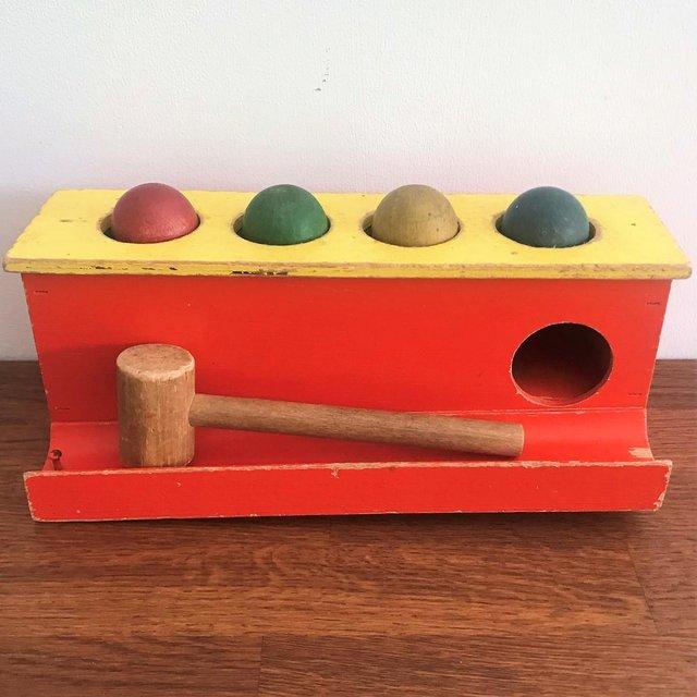 Preview of the first image of Vintage 1980's coloured wood balls & hammer traditional toy.