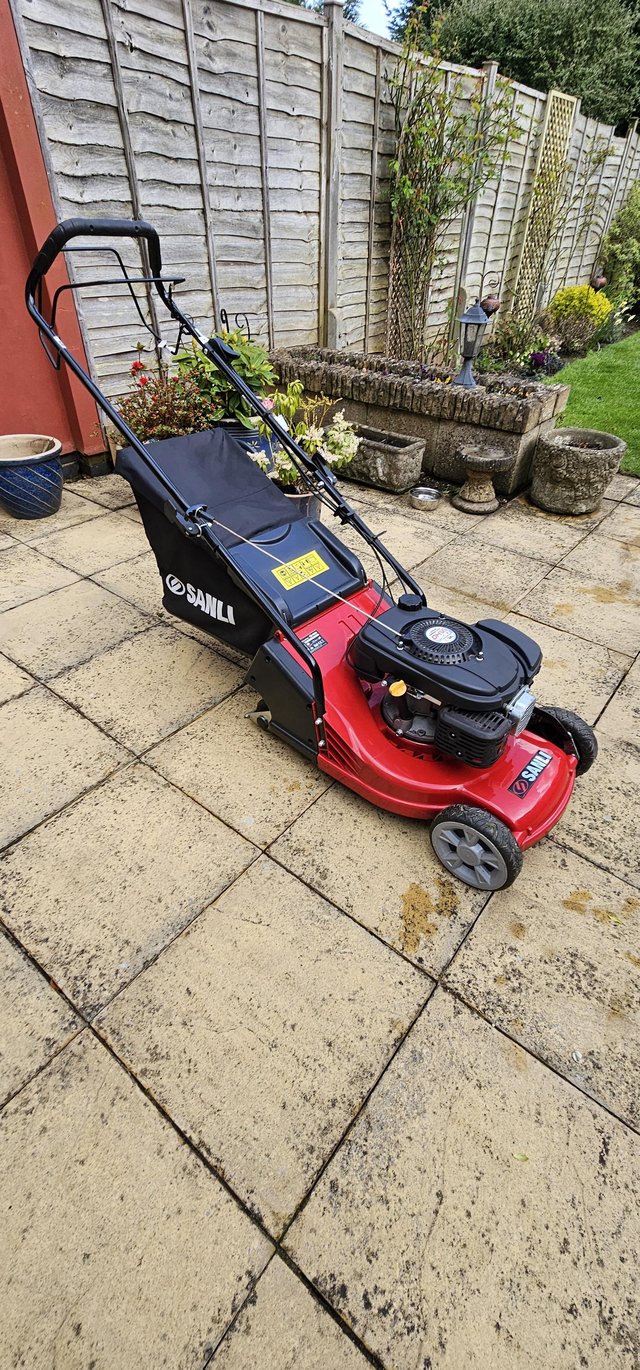 Preview of the first image of Sanli petrol lawnmower self propelled rear roller.