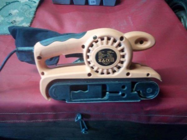 Image 1 of Belt sander, portable with carrying case in good working ord