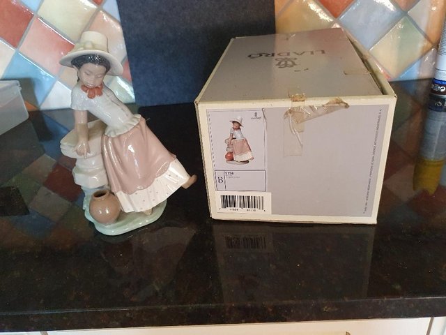 Preview of the first image of Lladro a steppin time perfect condition with original box.