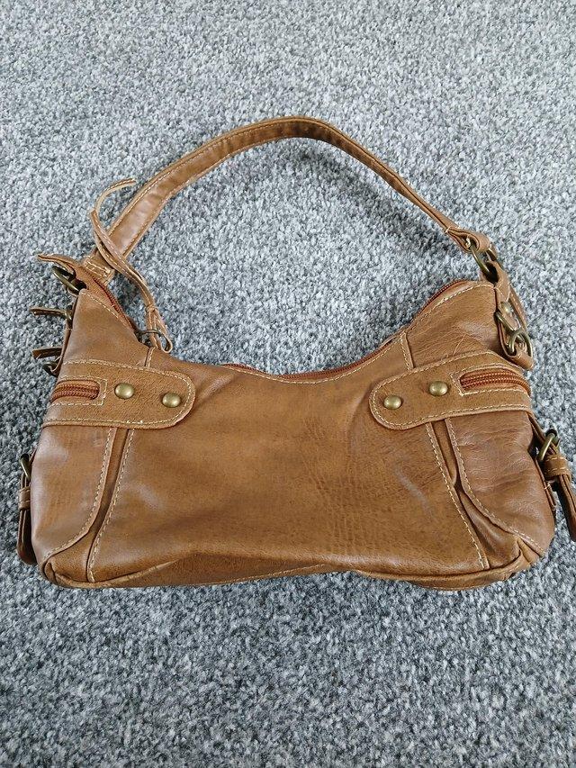 Preview of the first image of New Look Ladies brown handbag.