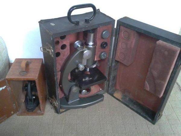 Image 1 of 2 Microscopes,Archaeology, Archaeologist fieldwork
