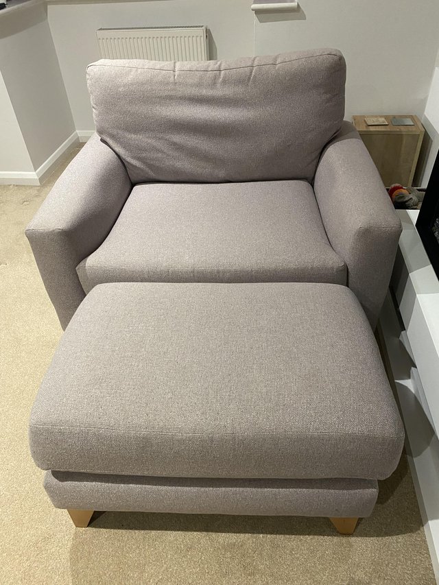 Preview of the first image of Lilac armchair with footstool.