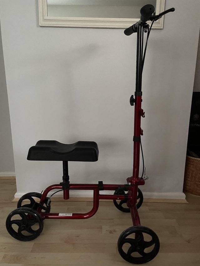 Preview of the first image of 2 Red Folding Walking Mobility Knee Scooters with Baskets..