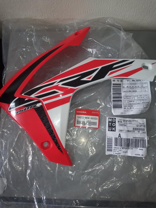Preview of the first image of Honda 450R side panel new.