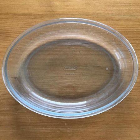 Image 3 of Pyrex clear oval dish, scratched.