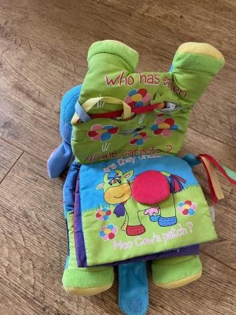 Image 2 of Baby toys including soft book and rattle