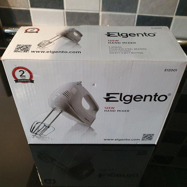 Preview of the first image of Hand held electric mixer in box.