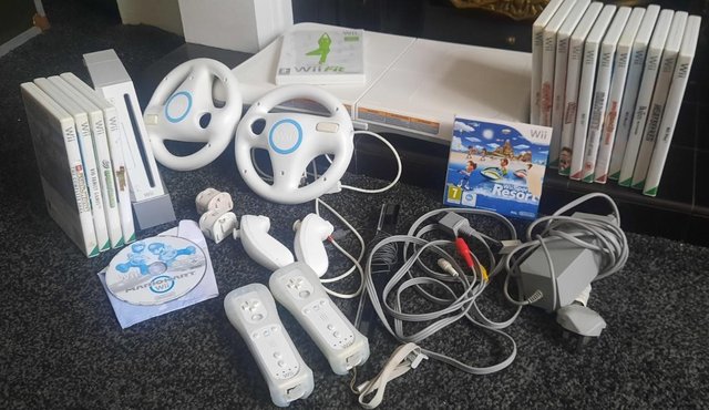 Preview of the first image of Wii Console, Balance Board, Controllers and Games Bundle.