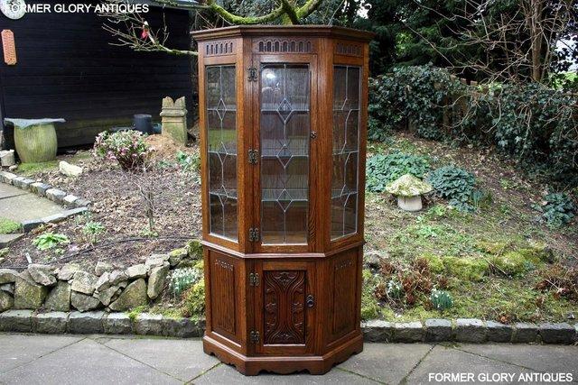 Image 1 of OLD CHARM LIGHT OAK CANTED CHINA DISPLAY CABINET STAND UNIT