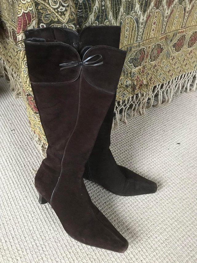 Preview of the first image of Stylish ECCO brown suede boots - size 5.