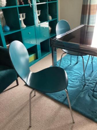 Image 3 of Black Glass Table, 4 teal blue chairs.