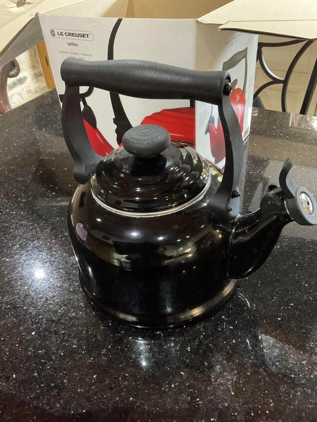 Preview of the first image of Le Crueset  whistling kettle in black.
