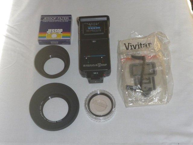 Preview of the first image of Vivitar 2500 Flash, 2 Hoods, and 2 Filters.