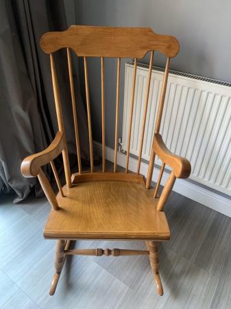 Image 1 of Large Wooden Rocking Chair.