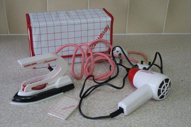 Preview of the first image of Stowaway Travel Iron, Hair Dryer, Sewing Kit Set Dual Volt.
