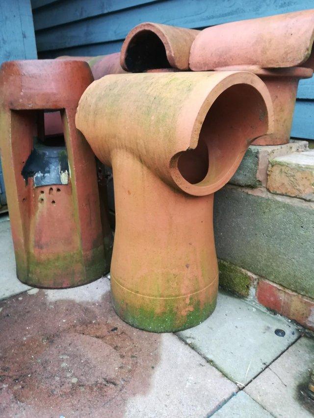 Preview of the first image of New chimney pot with rain cover..