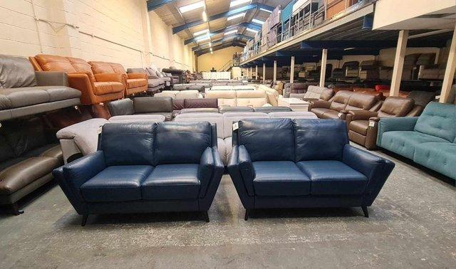 Preview of the first image of New Fellini blue leather pair of 2 seater sofas.