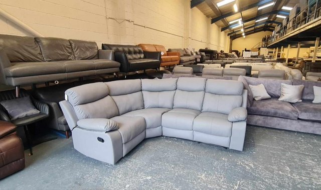 Preview of the first image of Ex-display grey bonded leather manual recliner corner sofa.