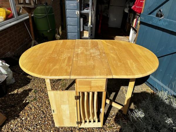Image 1 of Light pine table and chairs