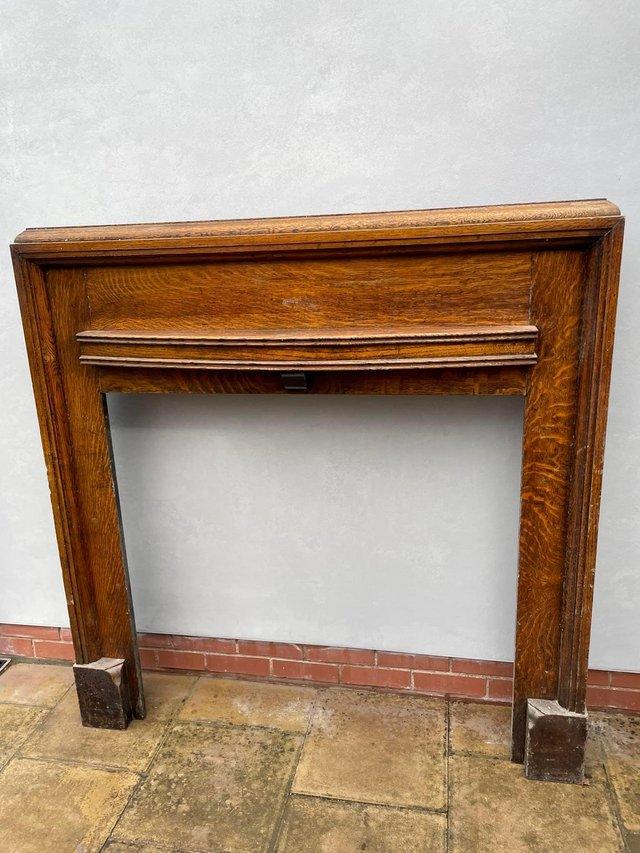 Preview of the first image of Solid oak fire surround from the 1930s.