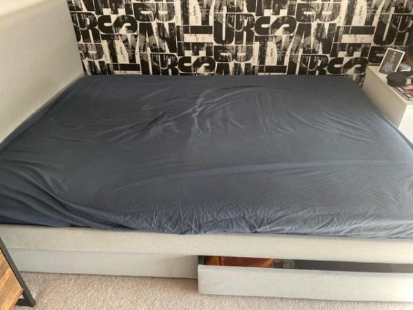 Image 1 of Upholstered IKEA bed with storage drawers and memory foam