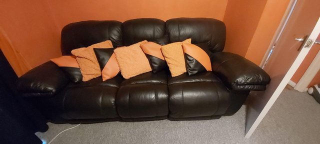 Preview of the first image of Black leather 3 seater sofa for sale. Excellent condition.