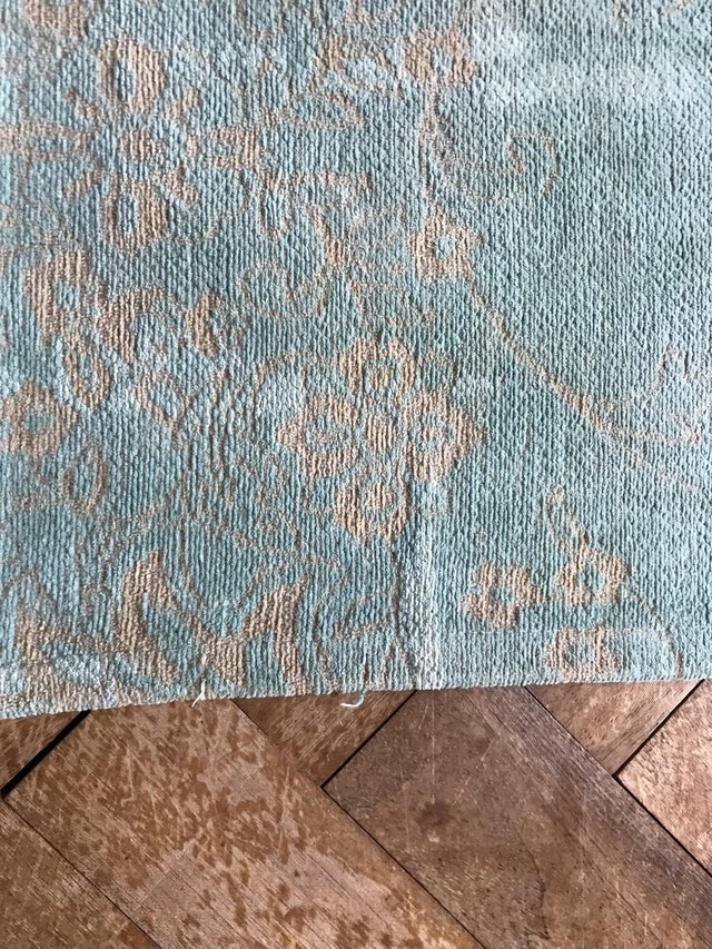 Preview of the first image of Vintage-style rectangular rug.
