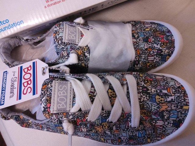 Preview of the first image of SKETCHERS , GIRLS SIZE 2.5 ,DESIGNER , DAPPY DAILY, DOGS..