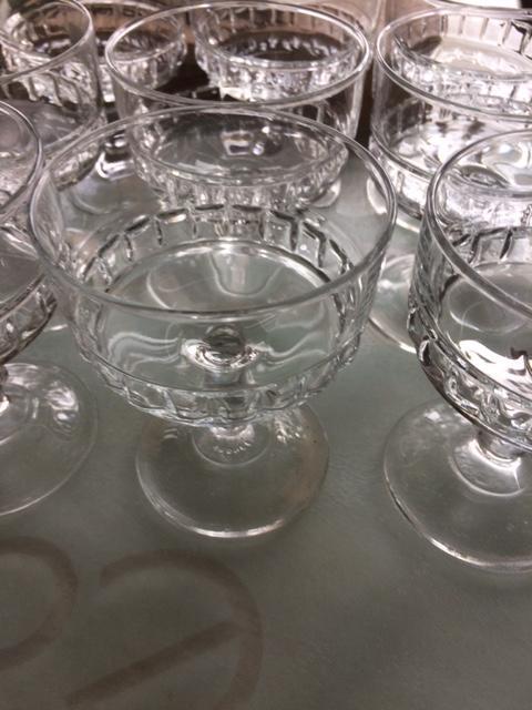 Preview of the first image of vintage  Glass set of 9 Sundae dishes with stems.