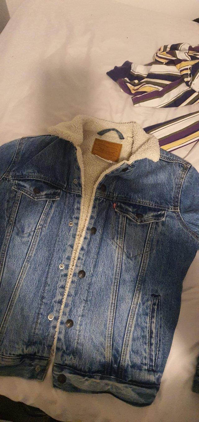 Preview of the first image of Levis denim jacket size s good condition.