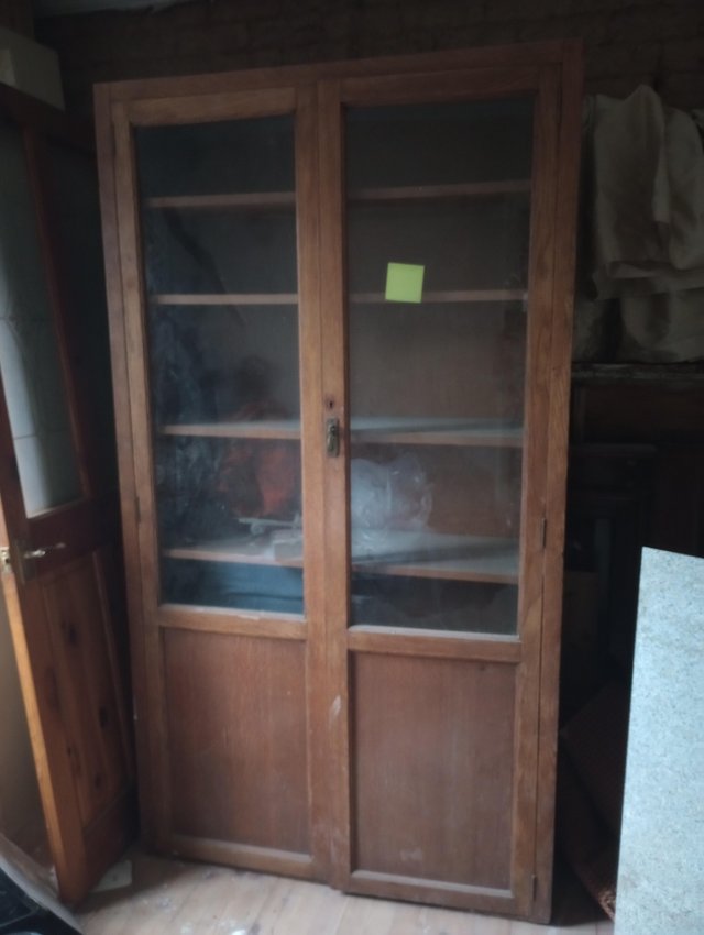 Preview of the first image of Vintage glass door cabinet.